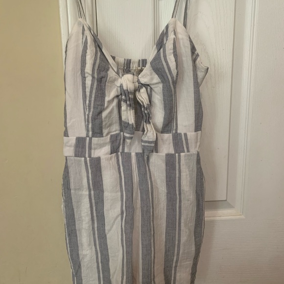 Striped romper with pockets and adjustable straps - Picture 2 of 2